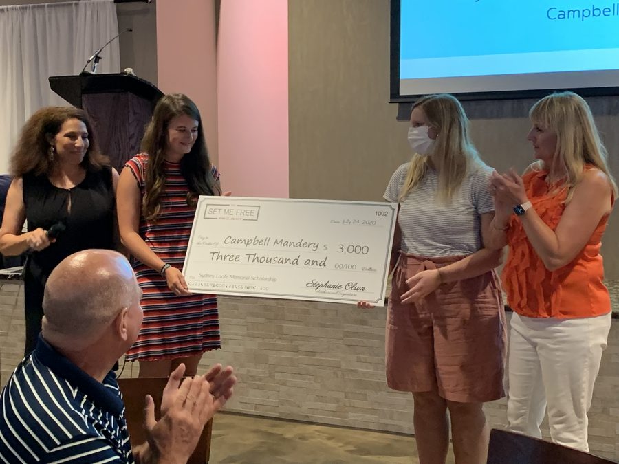 Campbell Mandery receiving the 2020 scholarship